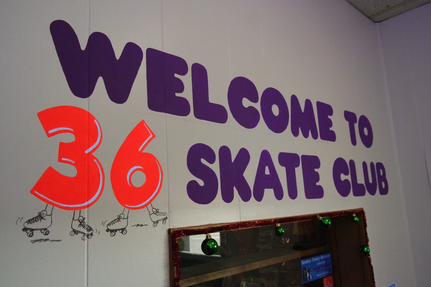Welcome to 36 Skate Club mural painted inside the roller rink entrance in Piqua, Ohio